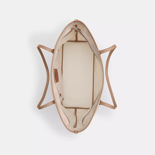 COACH |
Large City Tote Bag In Maxi Signature Canvas | Bolso de mano grande