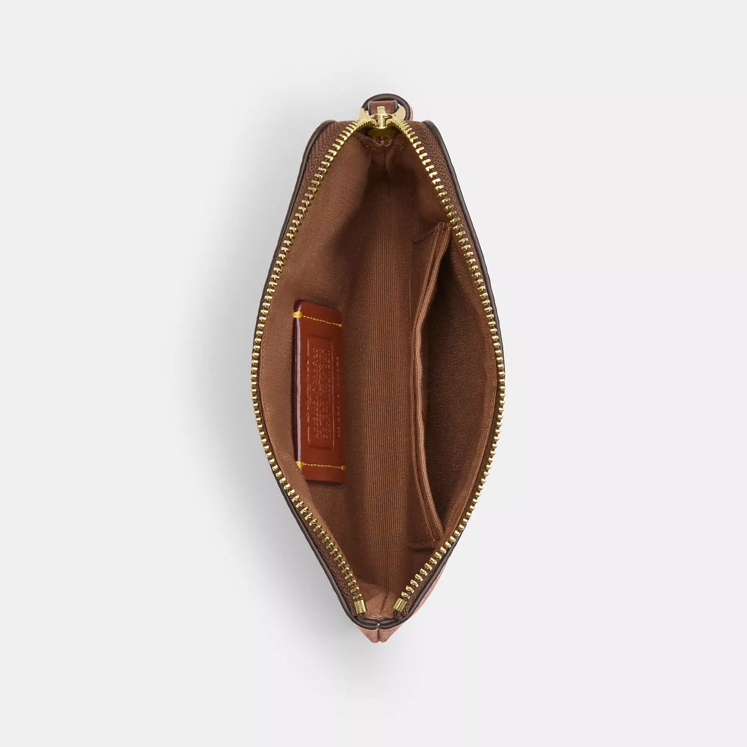 COACH |
Corner Zip Wristlet In Signature Canvas With Halloween Print | Cartera de Halloween