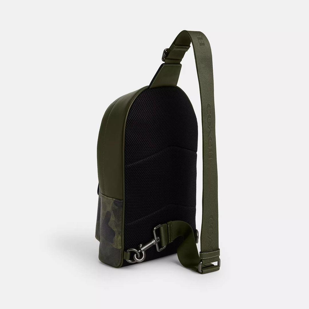 𝐂𝐎𝐀𝐂𝐇                 Mochila West con el característico estampado de camuflaje        CO0034