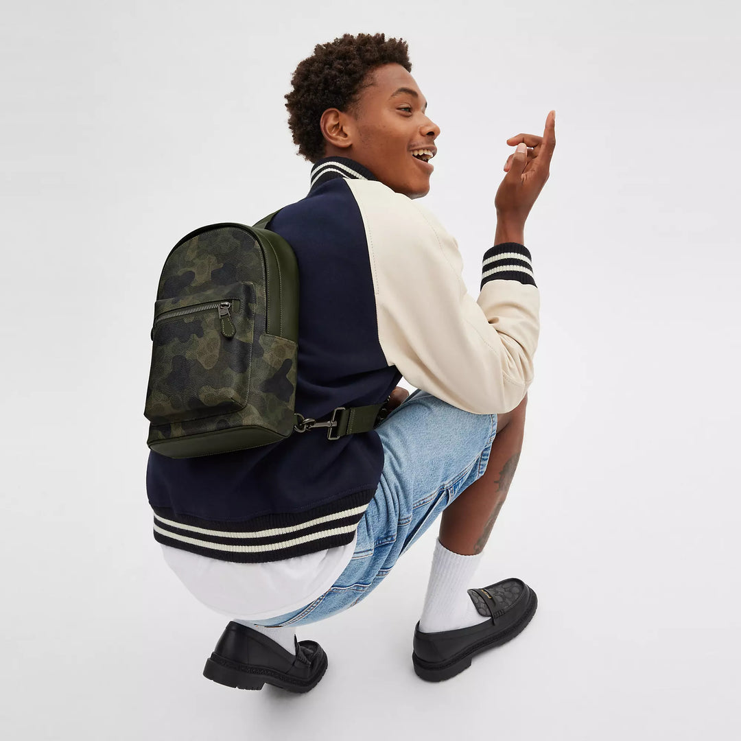𝐂𝐎𝐀𝐂𝐇                 Mochila West con el característico estampado de camuflaje        CO0034