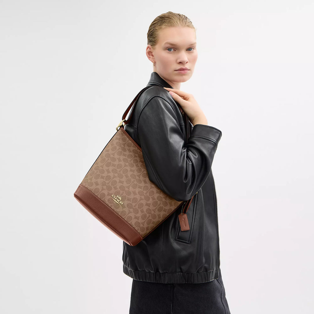 ššššš                     Bolso Jude en lona de la firma                     CO0022