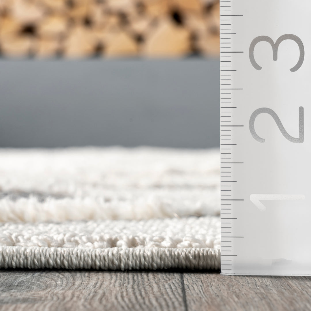 𝐍𝐔𝐋𝐎𝐎𝐌 Alfombra geométrica de transición con borlas NU020