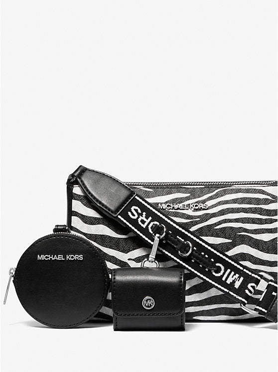 ššššššš šššš                          Bolso bandolera mediano Jet Set de piel con estampado animal y logotipo, con estuche                          MK0015