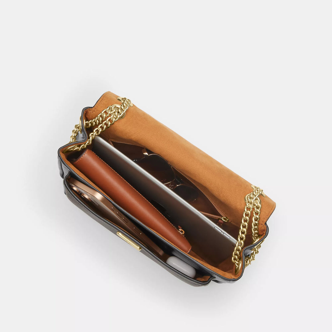 𝐂𝐎𝐀𝐂𝐇                     Bolso bandolera Elodie en lona de la firma CO0011