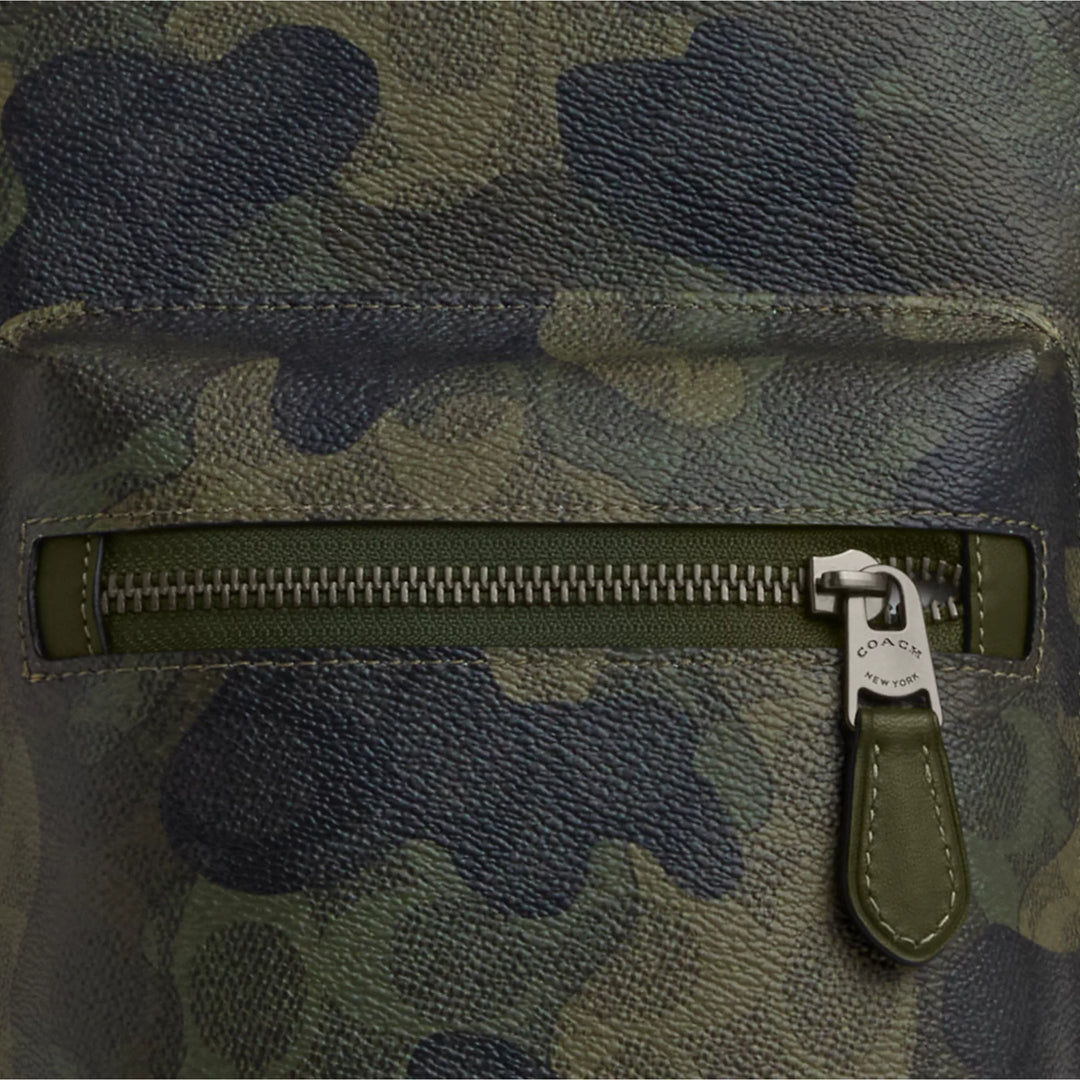 𝐂𝐎𝐀𝐂𝐇                 Mochila West con el característico estampado de camuflaje        CO0034
