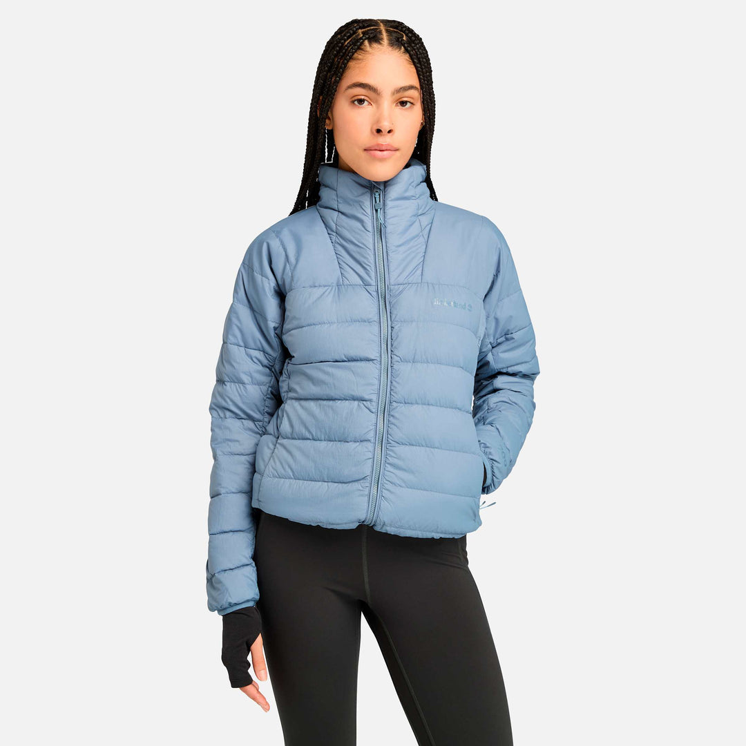 𝐓𝐈𝐌𝐁𝐄𝐑𝐋𝐀𝐍𝐃 Chaqueta ligera de plumón reciclado con cabeza de oso para mujer TIM26