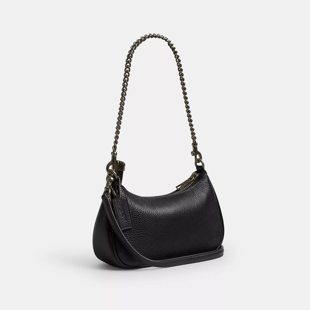 COACH | Teri Mini Crossbody Bag With Rivets | bolso negro con estoperoles con lunas y estrellas