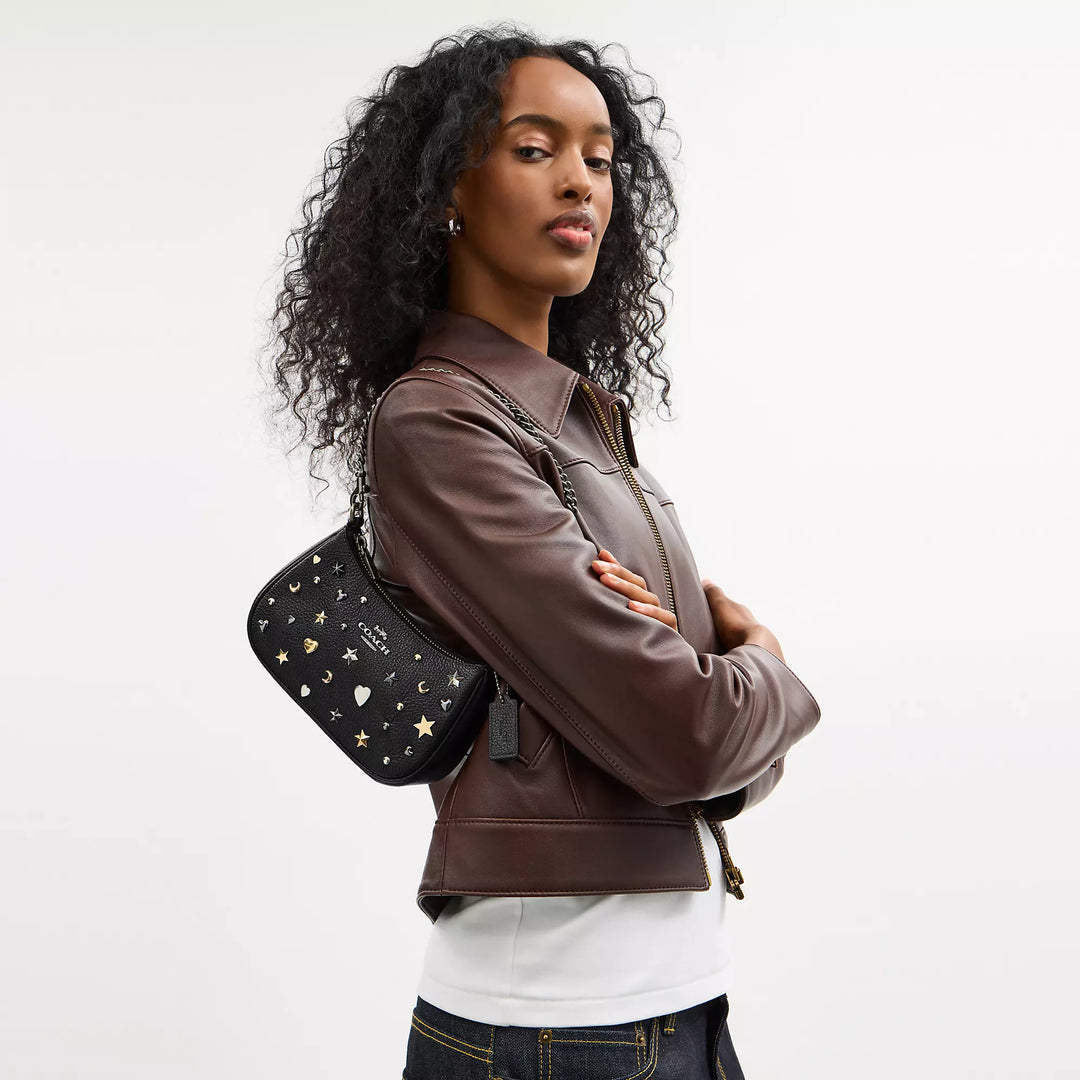 COACH | Teri Mini Crossbody Bag With Rivets | bolso negro con estoperoles con lunas y estrellas