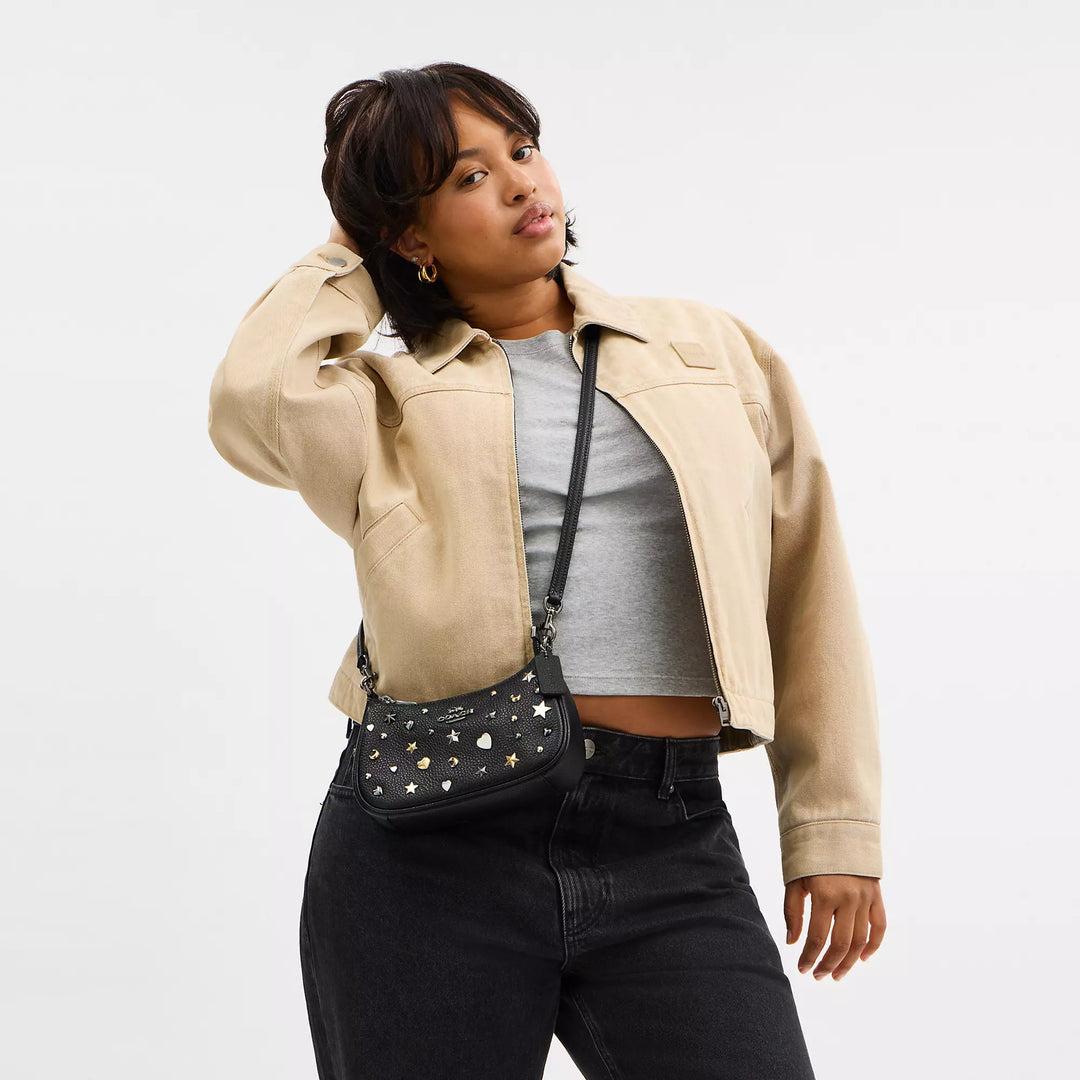 COACH | Teri Mini Crossbody Bag With Rivets | bolso negro con estoperoles con lunas y estrellas