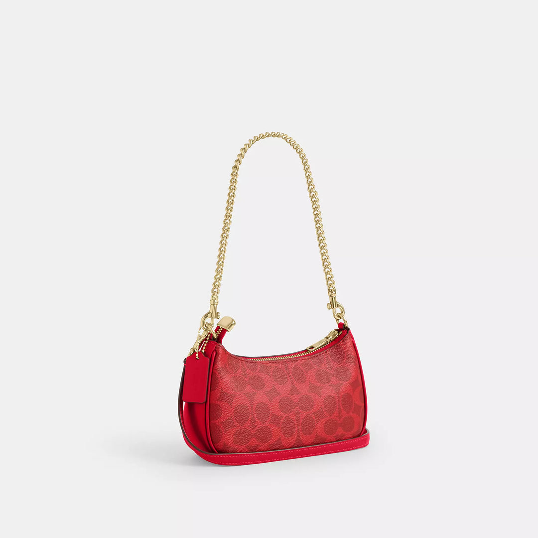 𝐂𝐎𝐀𝐂𝐇                     Bolso bandolera mini Teri en lona de la firma CO0023