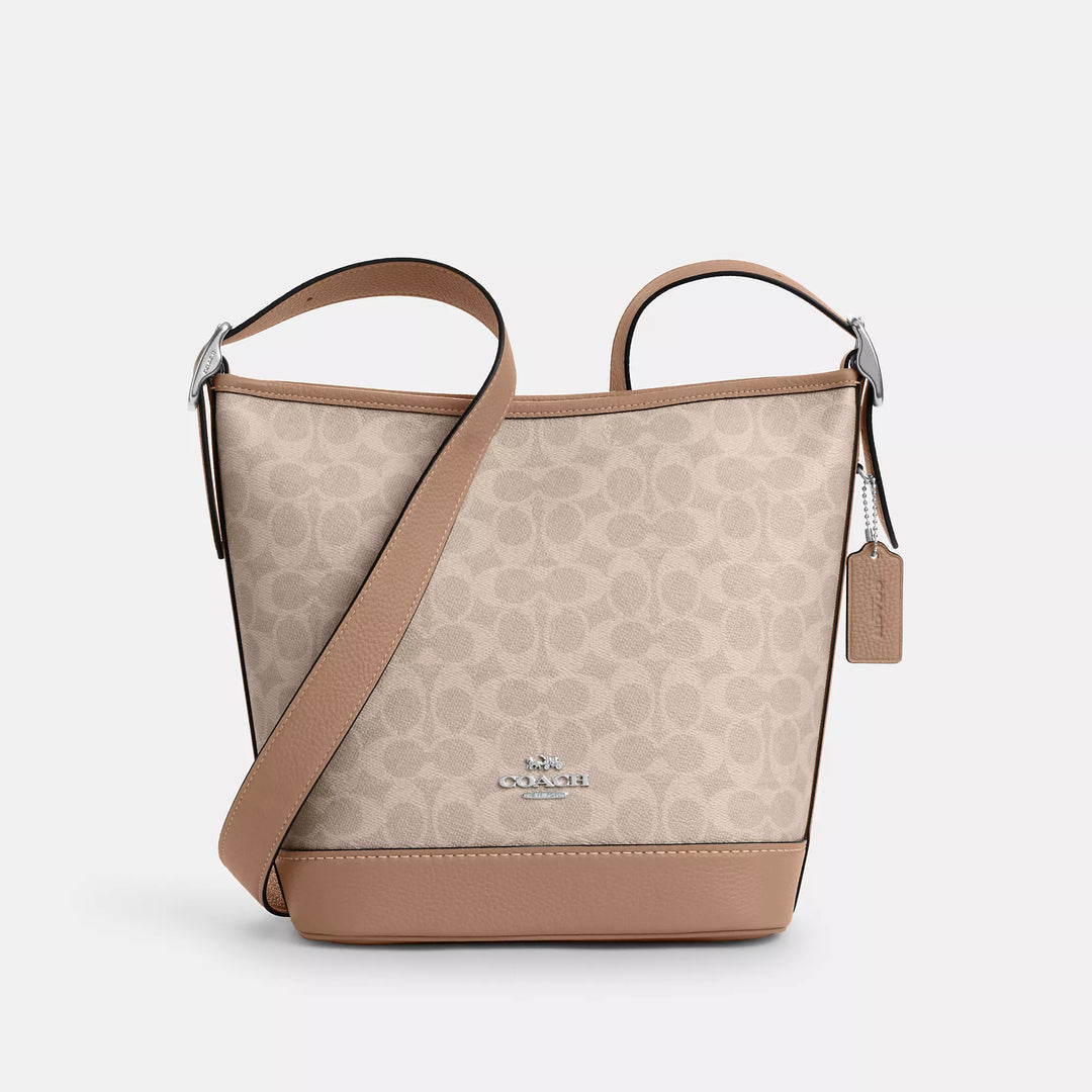 𝐂𝐎𝐀𝐂𝐇                     Bolso Jude en lona de la firma                     CO0022
