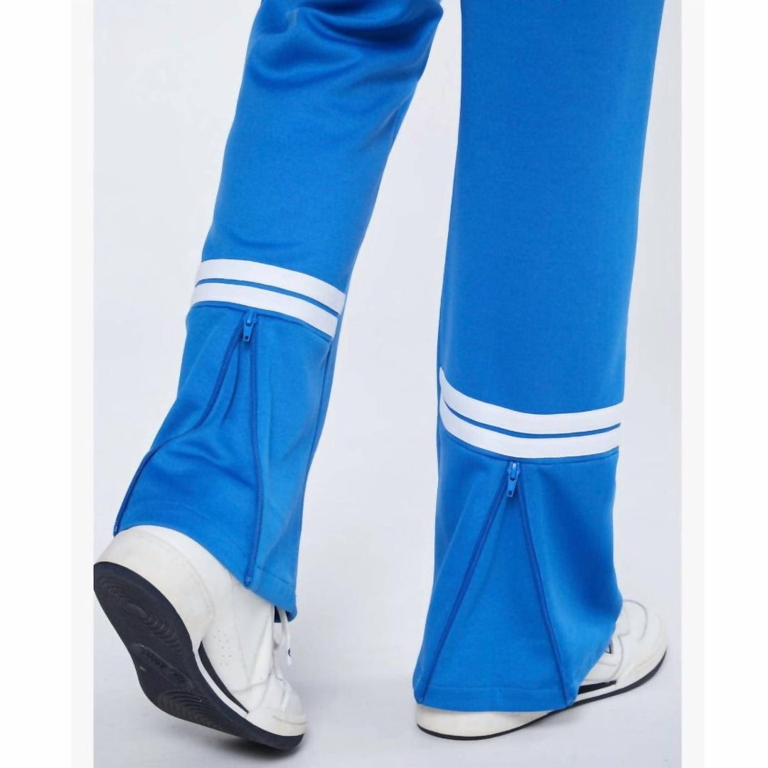 𝐒𝐄𝐑𝐆𝐈𝐎 𝐓𝐀𝐂𝐂𝐇𝐈𝐍𝐈 Pantalones deportivos Orion en azul palacio y blanco TAC50