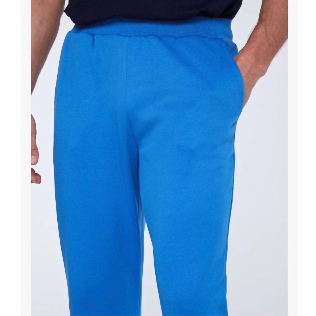 𝐒𝐄𝐑𝐆𝐈𝐎 𝐓𝐀𝐂𝐂𝐇𝐈𝐍𝐈 Pantalones deportivos Orion en azul palacio y blanco TAC50