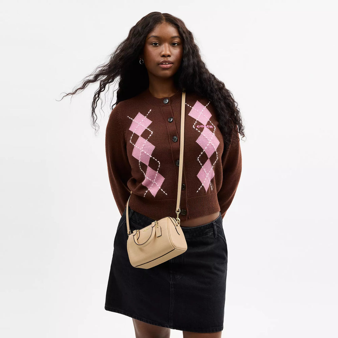 𝐂𝐎𝐀𝐂𝐇                       Mini bolso bandolera Rowan en piel de la firma CO009