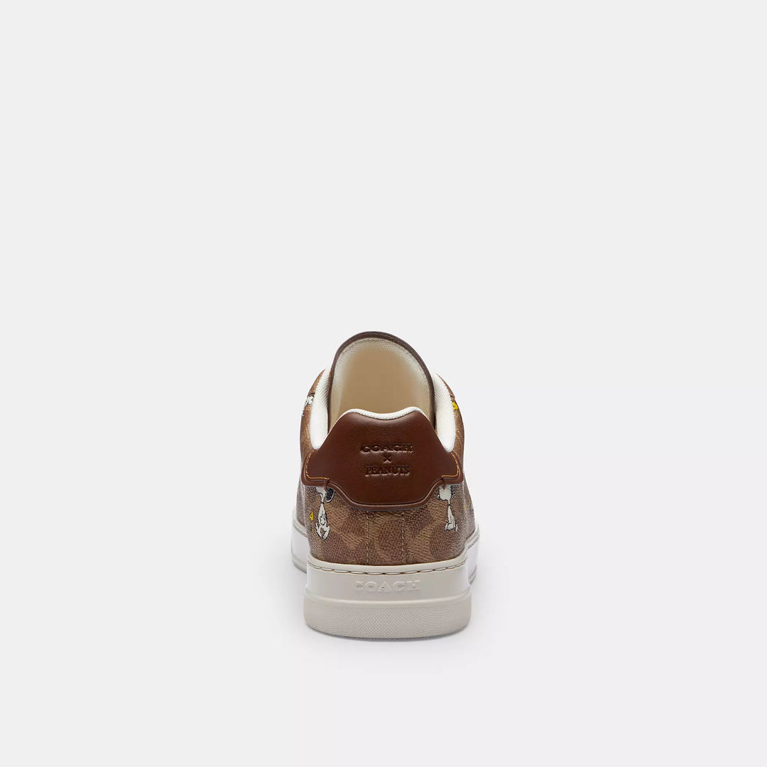 𝐂𝐎𝐀𝐂𝐇              Zapatillas deportivas Coach x Peanuts High Line en lona distintiva con estampado de Snoopy                 CO0017