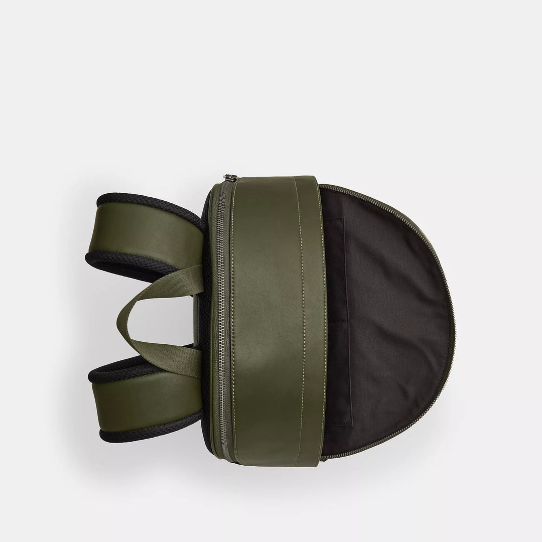 𝐂𝐎𝐀𝐂𝐇                 Mochila West con el característico estampado de camuflaje        CO0033