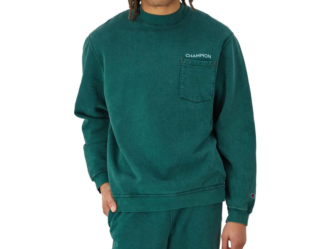 𝐂𝐇𝐀𝐌𝐏𝐈𝐎𝐍                         Sudadera de cuello redondo con bolsillo lavado para hombre en verde noche.                                MSM10