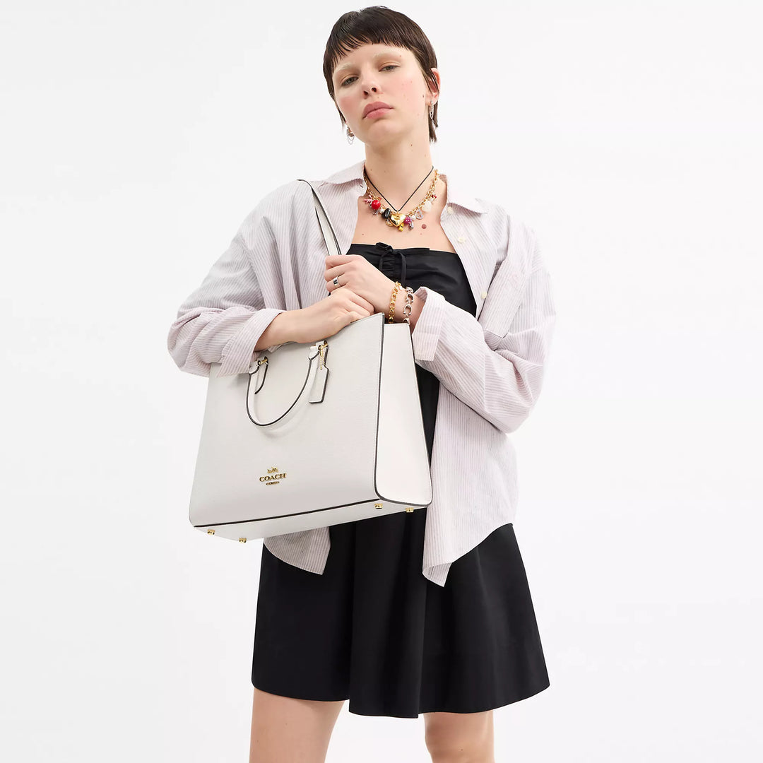 𝐂𝐎𝐀𝐂𝐇                     Bolso de mano Maggie CO0027