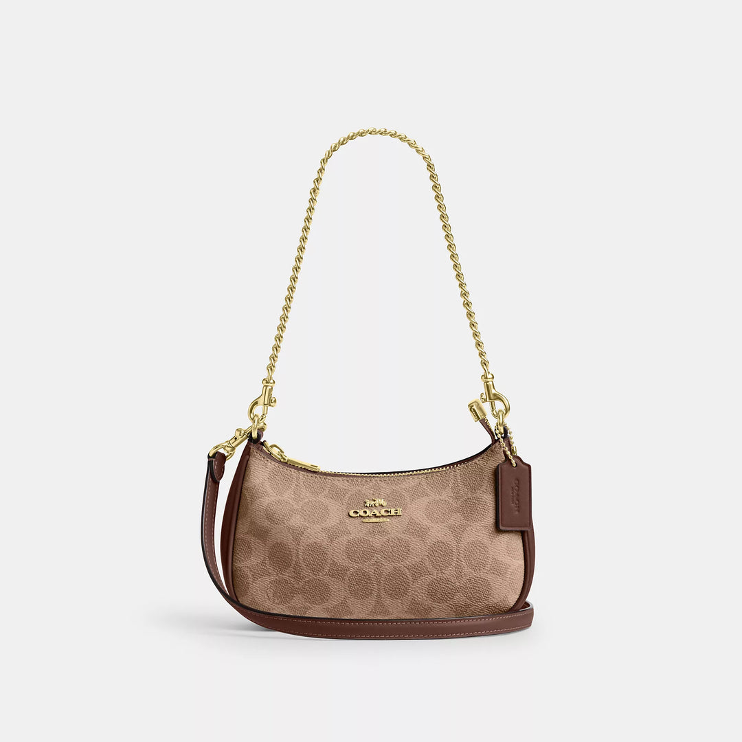 𝐂𝐎𝐀𝐂𝐇                     Bolso bandolera mini Teri en lona de la firma CO0023