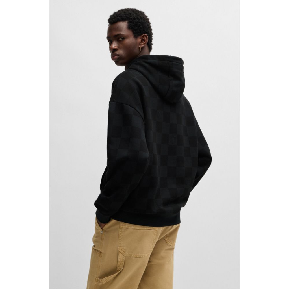 𝐇𝐔𝐆𝐎                                       Sudadera holgada con capucha de algodón de rizo y estampado de cuadros
MSM61