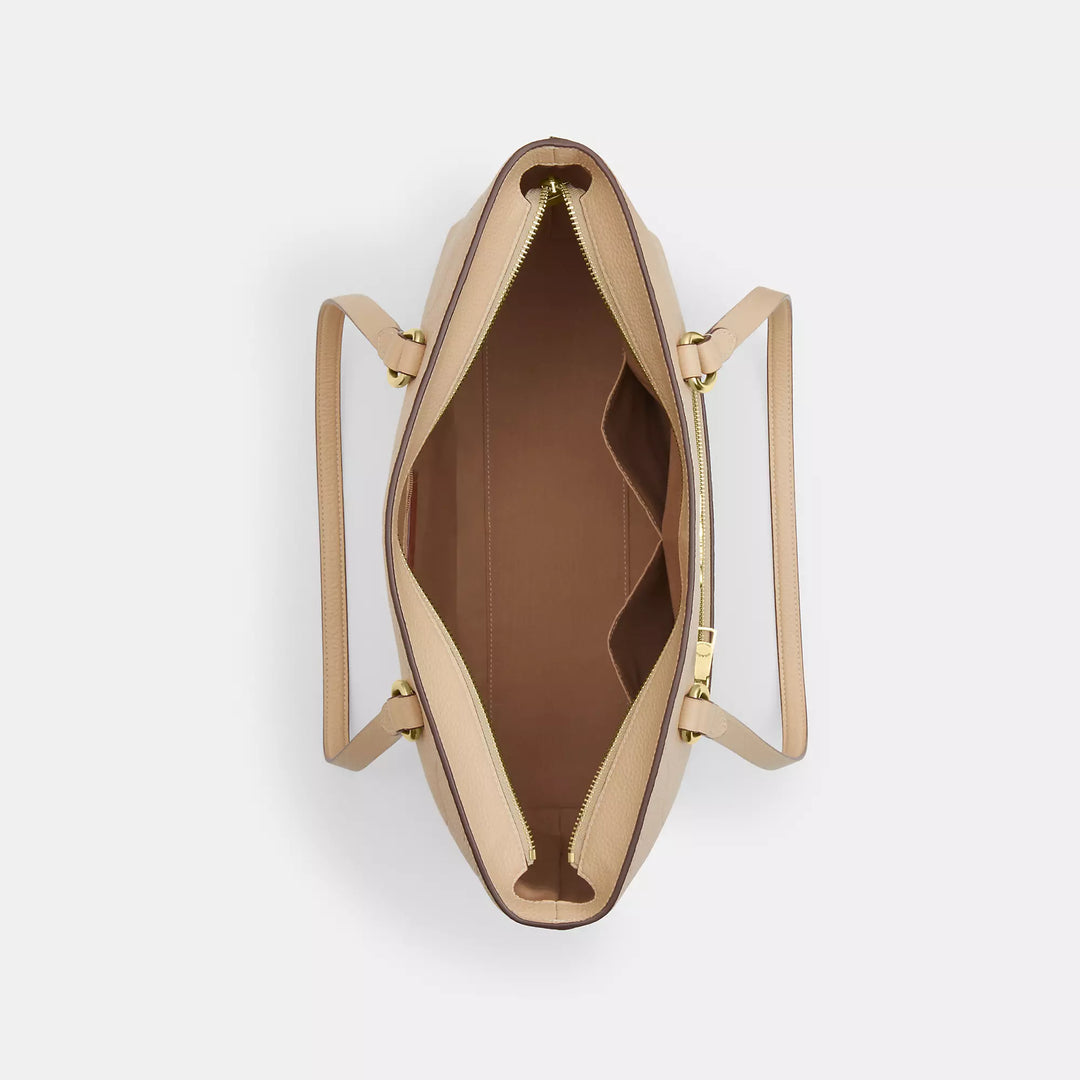 𝐂𝐎𝐀𝐂𝐇                     Bolso tote Station en piel de la firma            CO0013