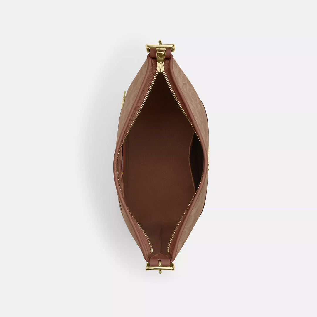 𝐂𝐎𝐀𝐂𝐇                     Bolso Jude en lona de la firma                     CO0022