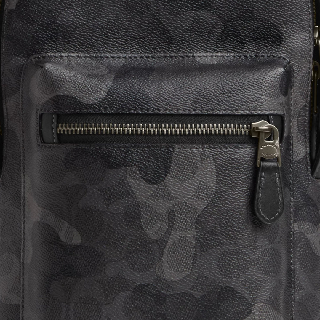 𝐂𝐎𝐀𝐂𝐇                 Mochila West con el característico estampado de camuflaje        CO0034