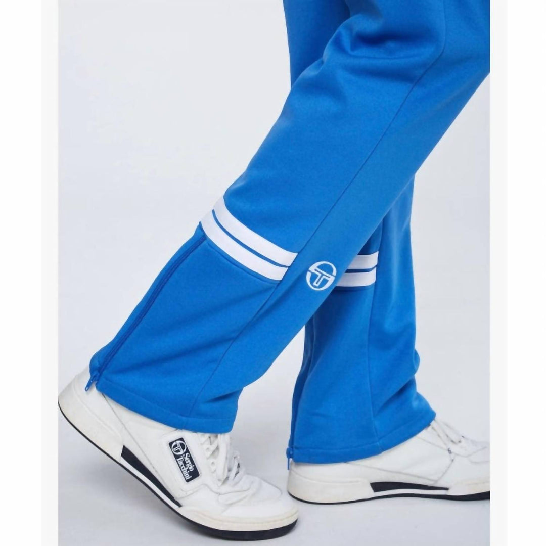 𝐒𝐄𝐑𝐆𝐈𝐎 𝐓𝐀𝐂𝐂𝐇𝐈𝐍𝐈 Pantalones deportivos Orion en azul palacio y blanco TAC50