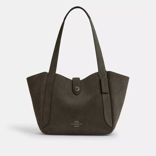 𝐂𝐎𝐀𝐂𝐇                     Bolso de mano Hadley con cierre giratorio CO003