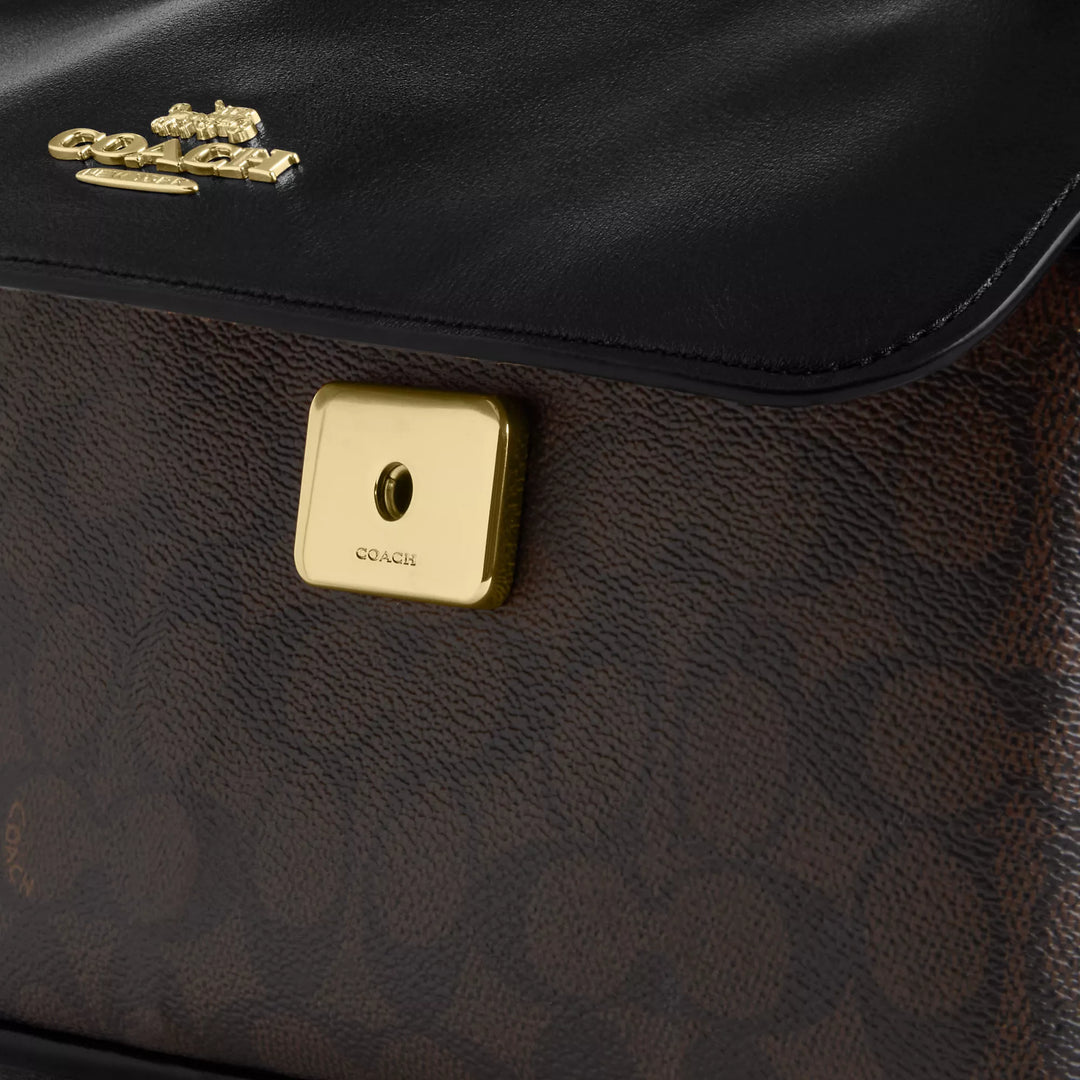 𝐂𝐎𝐀𝐂𝐇                     Bolso bandolera Elodie en lona de la firma CO0011