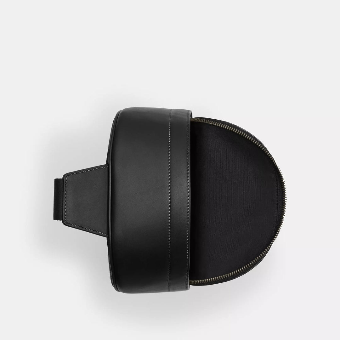 𝐂𝐎𝐀𝐂𝐇                 Mochila West con el característico estampado de camuflaje        CO0034