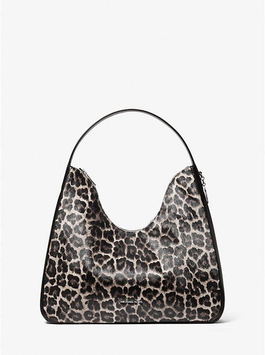 𝐌𝐈𝐂𝐇𝐀𝐄𝐋 𝐊𝐎𝐑𝐒     Bolso de hombro hobo Nayla mediano de pelo de becerro con estampado de leopardo MK0072