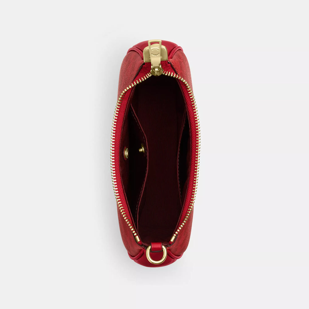 𝐂𝐎𝐀𝐂𝐇                     Bolso bandolera mini Teri en lona de la firma CO0023