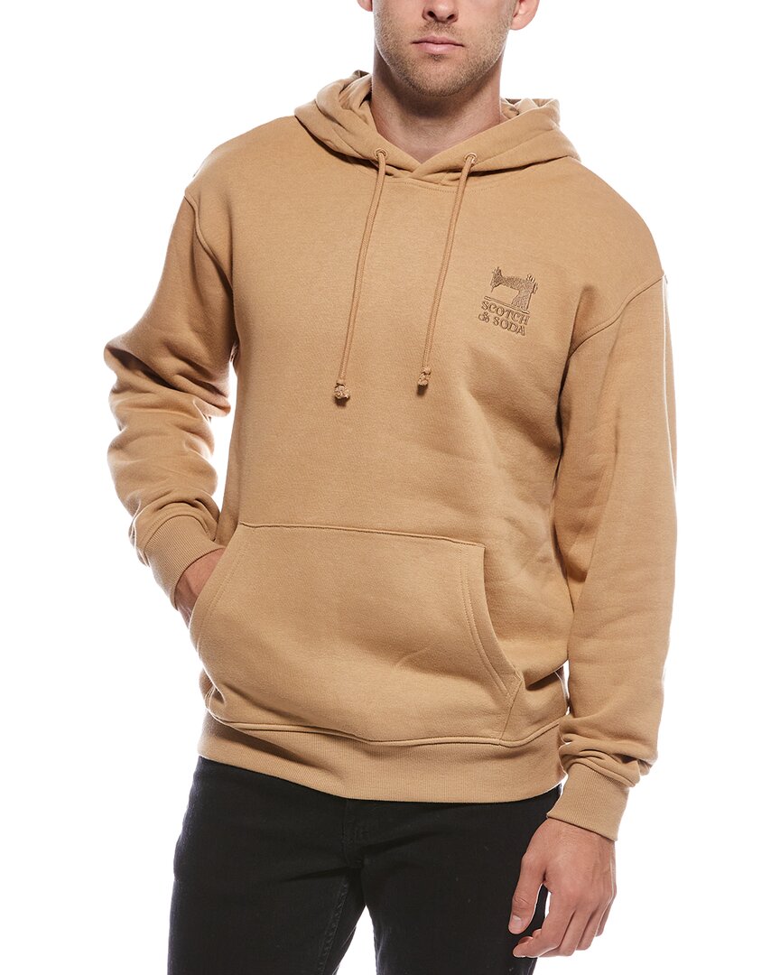 𝐒𝐂𝐎𝐓𝐂𝐇 & 𝐒𝐎𝐃𝐀                      Sudadera con capucha gráfica de corte relajado
MSM87