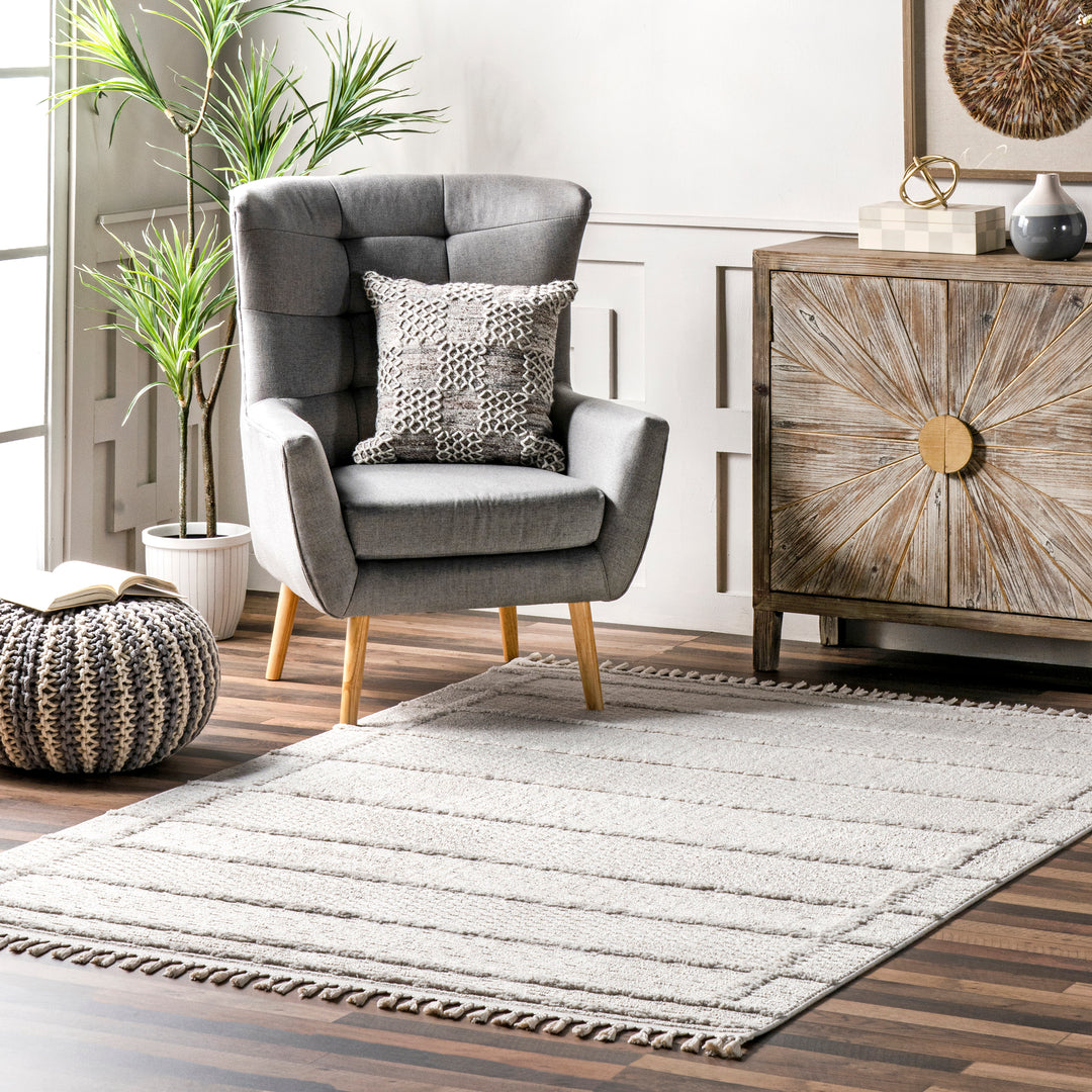 𝐍𝐔𝐋𝐎𝐎𝐌                          Alfombra informal con borlas y rayas Annella NU033